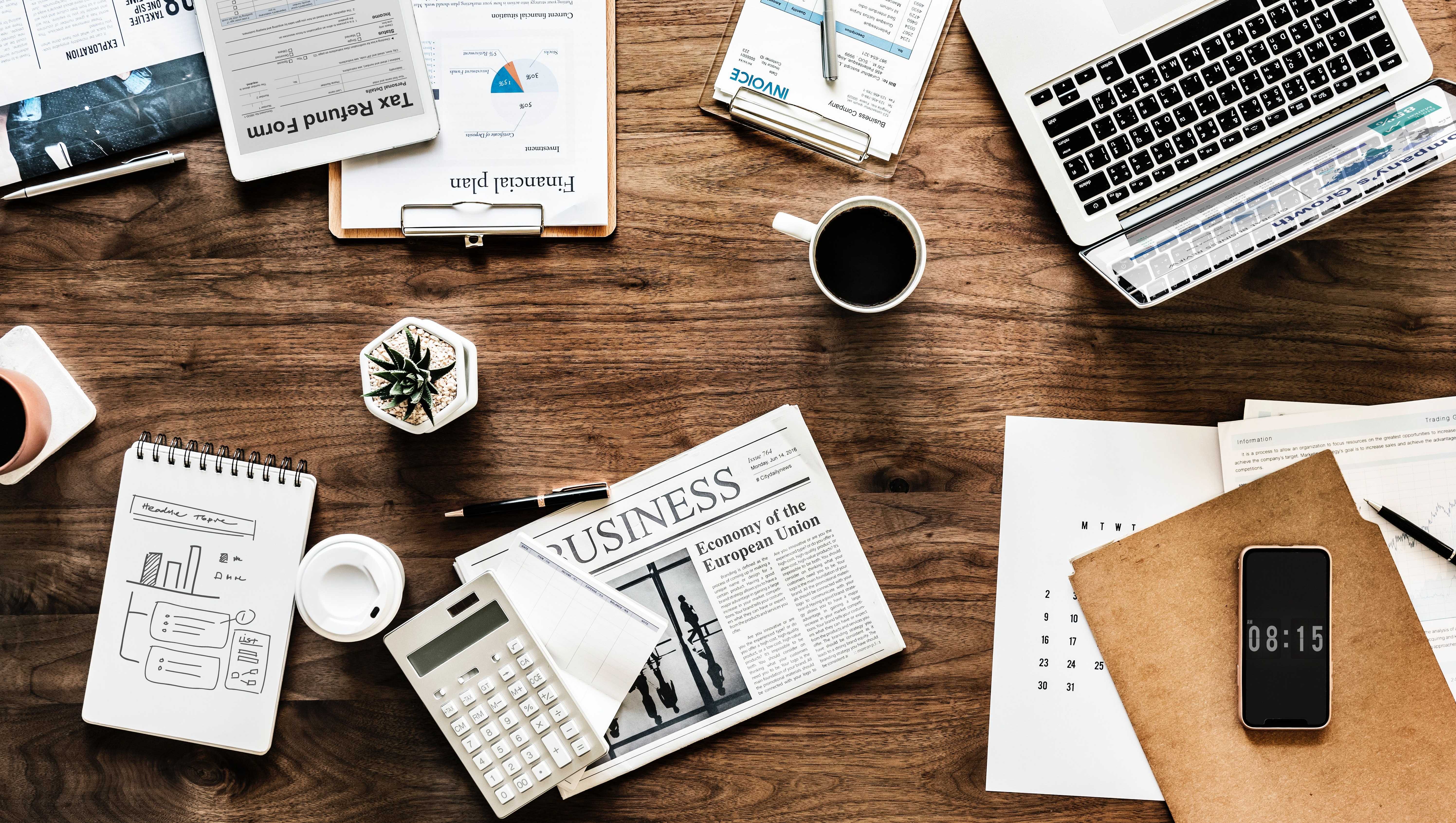 Image of a desk covered with notes